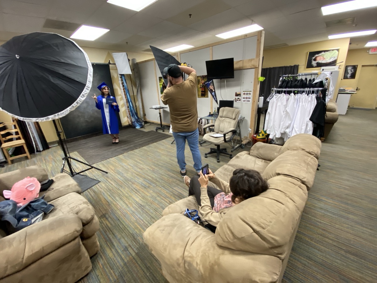 Behind the scenes — professional studio photo shoot in progress