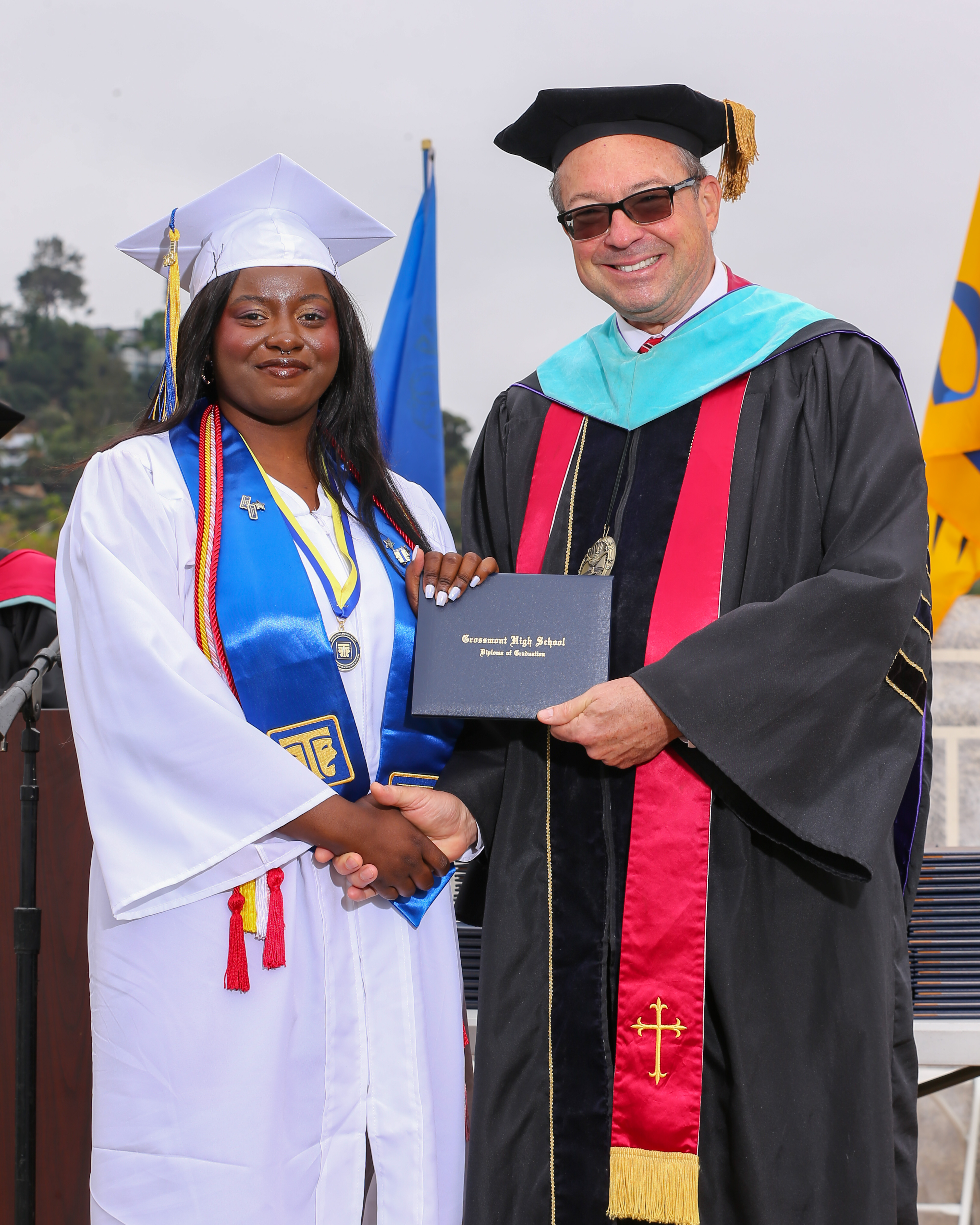 Graduate receiving diploma