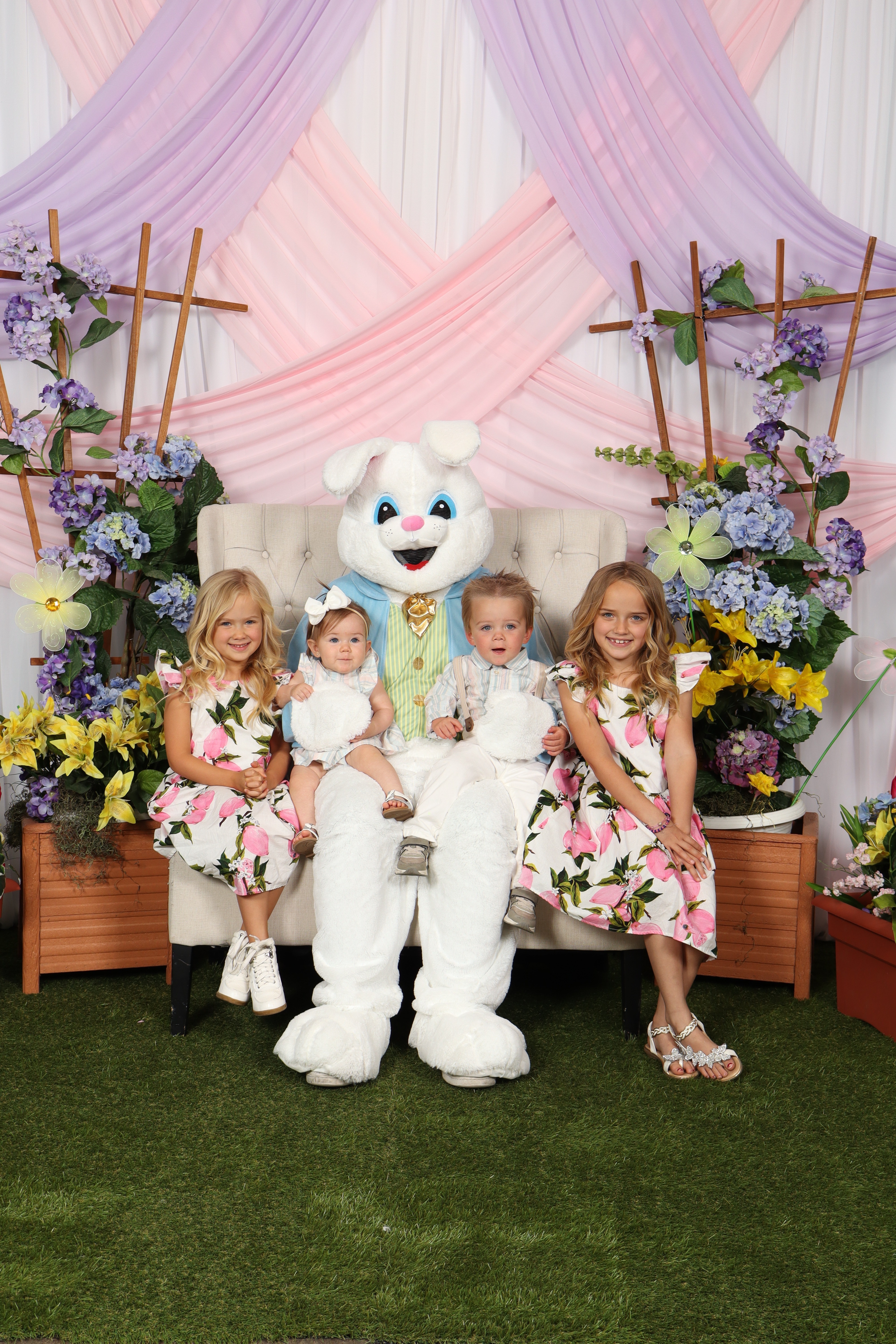 Group of children posing with the Easter Bunny